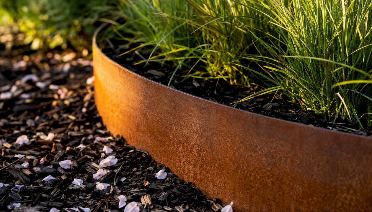 Corten steel garden edging with rust patina