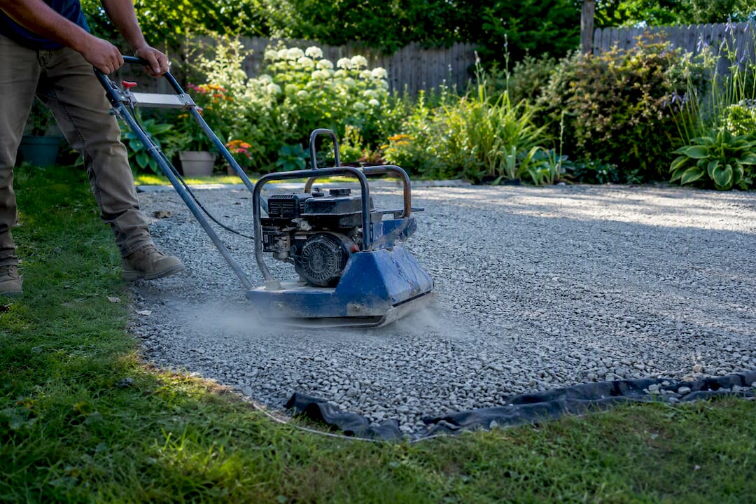 Compact gravel base for stone patio