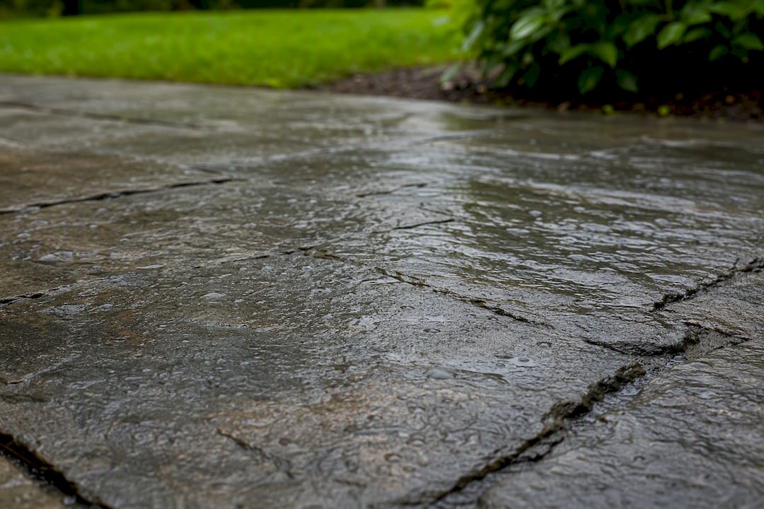 Wet cleft finish natural stone patio surface
