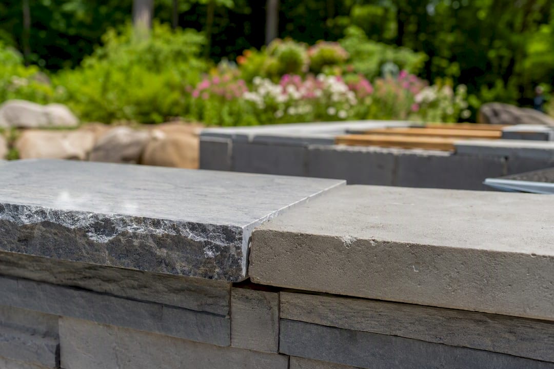Stone and concrete outdoor kitchen countertops textures