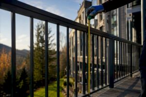 Tape measure checking outdoor guardrail height