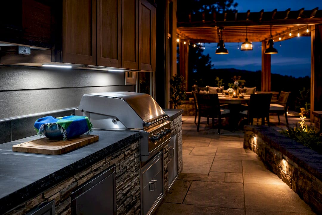 Outdoor kitchen showing task ambient and path lighting