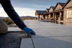 Porcelain pavers installed beside a New Hampshire home